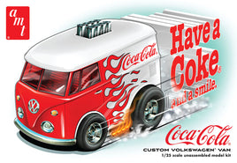 Model kit box of a Coca-Cola-themed Volkswagen van with flames and 'Have a Coke and a smile' text.