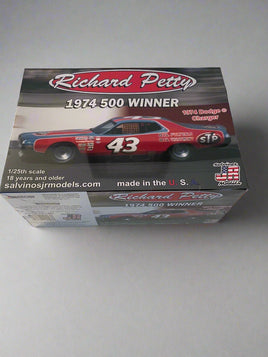 Model car packaging with Richard Petty and number 43 branding on a white background