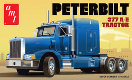 Model of a Peterbilt 377 A/E tractor truck on a yellow background with AMT logo.