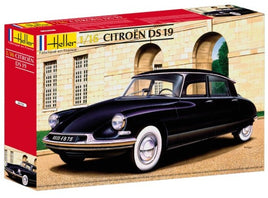 Model car kit box for Heller Citroén DS 19 with a classical building in the background
