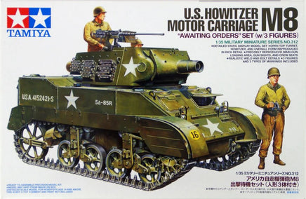 Model kit of U.S. Howitzer Motor Carriage M8 with figures on a Tamiya branded background